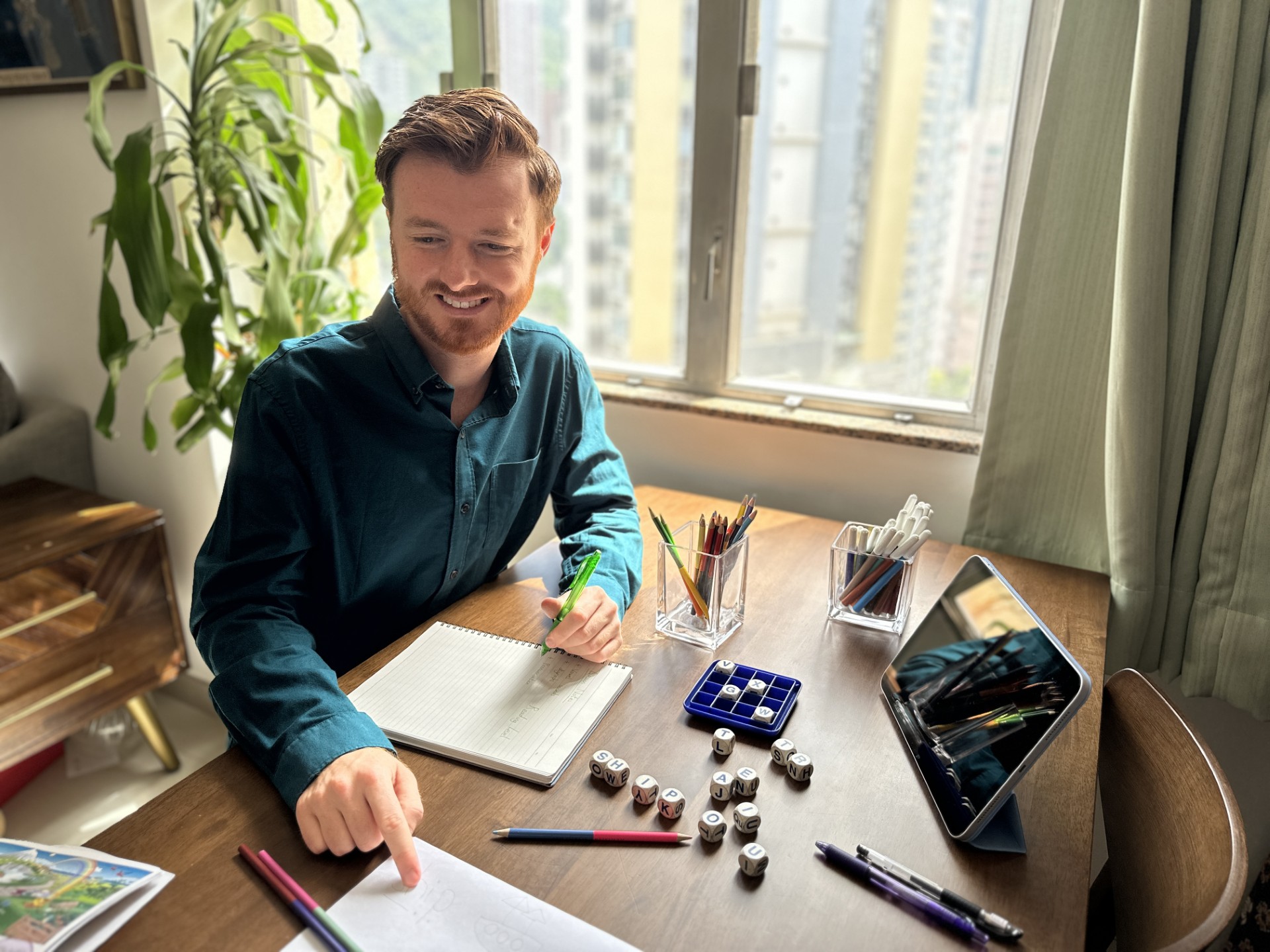 Dom teaching students in Hong Kong